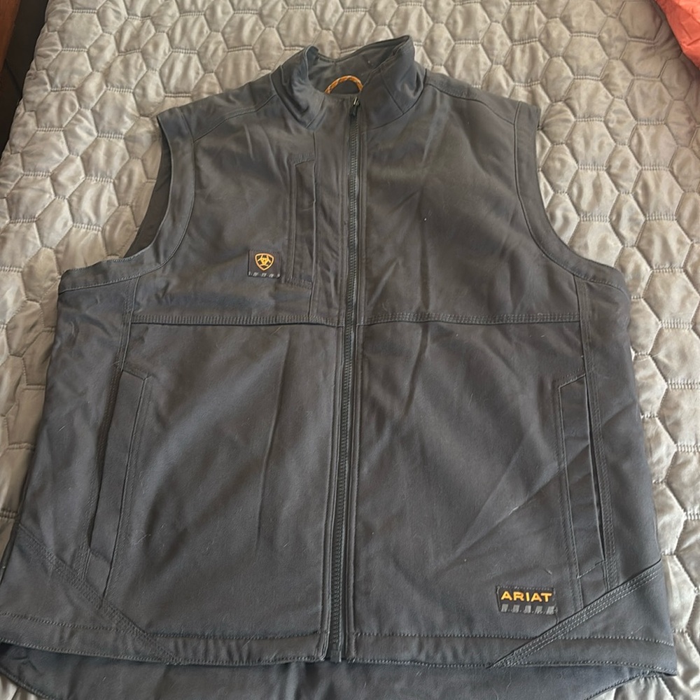 Ariat Rebar Gray vest. Never worn but tags have been removed.